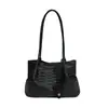 La popular bolsa de mano de estilo coreano de este año para mujer, nuevo modelo de verano 2026, bolso de hombro tejido de color liso, bolso de axila para el trabajo
