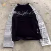 Al por mayor transfronterizo europeo y americano Camiseta de manga larga de otoño Rayas blancas y negras Bloques de color Diseño raglán Estampado Patrón Top de cuello redondo