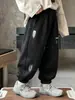 Ropa infantil pantalones para niños primavera y otoño 2026 nuevo estilo pantalones deportivos para niños pantalones de chándal casuales para niños pantalones largos para niños