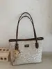 2026 nuevo bolso de hombro tipo tote de gran capacidad, alta calidad, nicho, con estampado de leopardo patchwork de textura mate