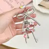 Chica Fresca Dulce Gato Kt Colgante para Llaves Bolso Personalizado Nota Musical Micrófono Cadena para Teléfono Móvil Lazo Colgante Pequeño de Regalo