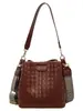 Bolsas de nicho de alta gama de moda para mujer 2026 nuevos bolsos de hombro de moda bolsos cruzados bolsos tipo cubo versátiles