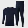 Ropa de otoño traje ropa interior térmica para hombre cuello redondo fino ajustado talla grande suéter base pantalones largos para hombre