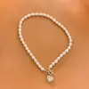 Collar de Perlas de Agua Dulce Arroz para Mujer Zirconia Microincrustada Hebilla Ot de Amor Cadena Corta de Clavícula Moda Temperamento Forma de Corazón