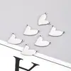 Colgante de acero inoxidable con doble agujero en forma de corazón, accesorio de lujo de alta gama estilo ins para pulsera y collar DIY, charm versátil para bolso pequeño
