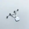 Europa y Estados Unidos transfronterizo AliExpress productos nuevos pendientes perforados pendientes de clavo de oreja con forma de corazón pendientes de clavo de oreja con cierre de rosca