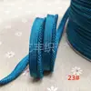 En stock 48 colores poliéster velcro con borde de cordón ribeteado tira de inserción de cuerda para ropa colchas sofás cojines tira de ribete