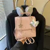 Mochila de lunares de nicho estilo coreano para mujer 2026 Nueva moda moderna Bolso de mano Mini mochila escolar casual para el día a día