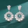 Joyas Huayoumei 2024 Nuevos pendientes de perla con diamantes completos estilo retro francés para mujer, temperamento, moda, estilo europeo y americano