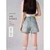 Shorts de mezclilla de color claro estilo americano para mujer, nuevo modelo de verano 2026, de cintura alta, adelgazantes, versátiles, aptos para petite, elegantes shorts ajustados de línea A