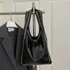 Moda Retrô Europeia e Americana de Comércio Exterior Transfronteiriço Bolsa de Ombro com Rebites para Axila Feminina 2025 Textura de Outono Bolsa Tote de Ombro para Motociclista