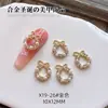 Nuevos Accesorios para Uñas al por Mayor Corona de Navidad Lazos Dorados y Plateados Perlas Incrustadas con Pedrería Aleación Metálica Decoraciones para Uñas