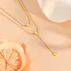 Europa y Estados Unidos nuevo colgante doble de estrella de acero inoxidable joyería transfronteriza acero de titanio no se decolora chapado en oro de 18k traje de joyería
