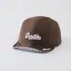 Sombrero de color sólido versátil para bebé con ala suave al por mayor nuevo sombrero solar transpirable para niño pequeño gorra de béisbol linda de cachorro para bebé