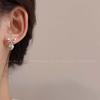 Pendientes sencillos con colgante de corazón y lazo plateado para niña, otoño e invierno de 2023, con temperamento de moda