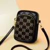 2025 Nueva Moda Casual Tendencia Bolso de Mujer Estilo Coreano Bolso de Hombro Bolso de Diamante para Teléfono Móvil Billetera Diagonal de Monedas Accesible Lujo