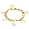Pulsera de Acero de Titanio Chapado en Oro de 18K Estilo Nuevo Transfronterizo con Trébol de Cuatro Hojas y Concha Blanca para Mujer, Moderna y Versátil, Sensación de Alta Gama, Joyería que no se Desvanece
