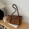 Elegante bolsa de mano de gran capacidad estilo francés para principios de otoño 2026, bolso de hombro de nicho, alta costura, elegante, bolsa ligera para el hombro