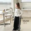 Tutu Elefantinho Roupa Infantil Camiseta de Manga Longa para Meninas Nova Coleção Primavera 2026 Camiseta Básica Infantil para Crianças Maiores Estilo Coreano Roupa Pai e Filho