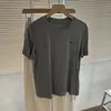 Camiseta de lana Tencel suave y agradable para la piel con bordado de poni para mujer, estilo coreano simple, adelgazante y versátil, cuello redondo, top de manga corta para verano