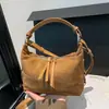 Bolsa de Ombro Retro de Cor Sólida de Alto Valor 2026 Novo Estilo Início do Outono Individual Elegante para o Dia a Dia Bolsa de Ombro Único Transversal