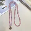 Elegante bolso nuevo de cadena cruzada para teléfono con cristal de gota de agua multicolor ultrabrillante y cadena larga para llevar en la espalda