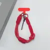 Estilo ins correa de teléfono tejida de color contrastante correa corta para la muñeca colgante de llavero de cámara CCD anti-pérdida unisex