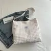 Bolso de mano de nicho estilo coreano 2026, a cuadros con bloques de color estilo ins, dulce y artístico, adecuado para que las chicas lo lleven a clase como bolso de hombro