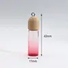 Creativo Nuevo Color Degradado Madera Grano Cubierta Vidrio Pequeña Botella Colgante Aceite Esencial Botella de Perfume Llavero Colgante Collar