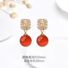 Aretes de Cinabrio para Mujer, Aretes Wangcai Xuanxue, Nuevo Estilo Caliente de Gama Alta, Nuevos Aretes Rojos Chinoserie, Accesorios de Otoño e Invierno