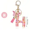 Llavero de moda con letras rosas, lentejuelas de amor, borla de mariposa, llavero, accesorios de colgante de epoxi de cristal para damas