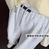 Pantalones de pierna ancha con pierna curva estilo perezoso etiqueta negra seleccionados cuidadosamente para mujer, nuevo estilo otoño e invierno, cintura alta, adelgazantes, pantalones deportivos, pantalones de chándal de caída en la cintura