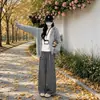 Pantalones casuales de cuadros negros y grises para mujer 2026 otoño e invierno nuevo estilo caída baja estatura lana franela holgados rectos de pierna ancha
