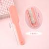Pente dobrável Mini Macaron fofo Pente de cabelo portátil Estudante Doméstico Plástico Pente de dentes macios Almofada de ar Pente