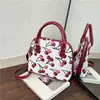 Bolsa feminina de concha de cereja transfronteiriça, bolsa de mão versátil, bolsa transversal, bolsa estampada, estilo preppy, Yamanashi Yoson