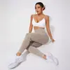 Pantalones de yoga ajustados sin costuras europeos y americanos transfronterizos, lavados a la arena, de secado rápido, de cintura alta, realzan los glúteos, para correr, deportes, fitness, pantalones de longitud 7/8