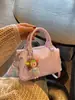Bolsa Boston de Design de Nicho Feminina 2026 Nova Bolsa de Mão de Alto Padrão para o Trabalho Bolsa de Ombro Único Transversal Bolsa Almofada
