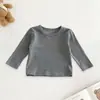 Conjunto Macacão Estampa Leopardo para Bebê 2026 Novo Estilo Coreano Conjunto de Duas Peças com Body de Manga Longa e Macacão com Suspensório