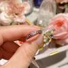 Anillo de pareja Camellia Seiko Edition con diseño de nicho de diamantes simulados de panal de abeja, estilo europeo y americano, anillo de lujo con destellos finos.