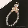 Nuevo Pulsera de Cristal con Cuentas y Llavero de Oso Sentado Lindo, Accesorio de Mano con Cadena de Oso Femenina Soñadora
