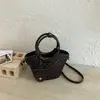 Bolsa de ombro único Bolsa de ombro única feminina com textura tecida simples e estilosa 2026 nova moda de verão bolsa tipo balde transversal com textura