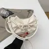 2025 Nuevo Bolso Pequeño Suave para Mujer Bolso Cruzado con Lazo Bolso de Hombro Versátil con Cadena Empalmada de Perlas