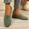 Nuevos zapatos planos de punto volador de estilo europeo y americano para mujer 2026, sin cordones, calados, transpirables, zapatos casuales