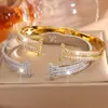 Versión Alta Pulsera de Acero Inoxidable Abierta Doble T Full Circonita Nueva para Mujer Estilo Europeo y Americano Lujo Ligero Pulsera Versátil sin Color Joyería