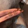 Brincos de Estrela de Cinco Pontas Circulares Vazados Microincrustados Estilo Coreano para Mulheres, Exquisitos e Modernos, Mesmo Estilo das Celebridades da Internet, Brincos Pequenos e Elegantes
