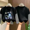 Camiseta de manga larga para niño 2026 nuevo modelo, camiseta básica de dibujos animados para niño, camiseta interior de algodón puro a rayas para otoño, estilo primavera y otoño