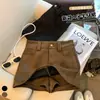Toma real de falda-pantalón corta de gamuza marrón vintage para mujer, de otoño e invierno, de cintura alta, adelgazante, anti-exposición, línea A, ajustada a la cadera