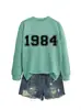 Amazon eBay sitio independiente casual simple cómodo mujer 1984 digital otoño e invierno nuevo cuello redondo manga larga sudadera