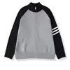 Elegante y casual cárdigan de punto nuevo para hombre de primavera y otoño, chaqueta suéter versátil de estilo coreano a rayas con cremallera y cuello alto para pareja