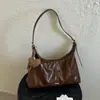2026 Nueva Bolsa de Albóndiga de Personalidad Retro Estilo Coreano Simple Gran Capacidad Monocarga Hombro Axila Bolso Cruzado Texturizado